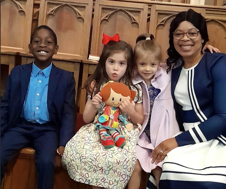 Church family with children in the sanctuary